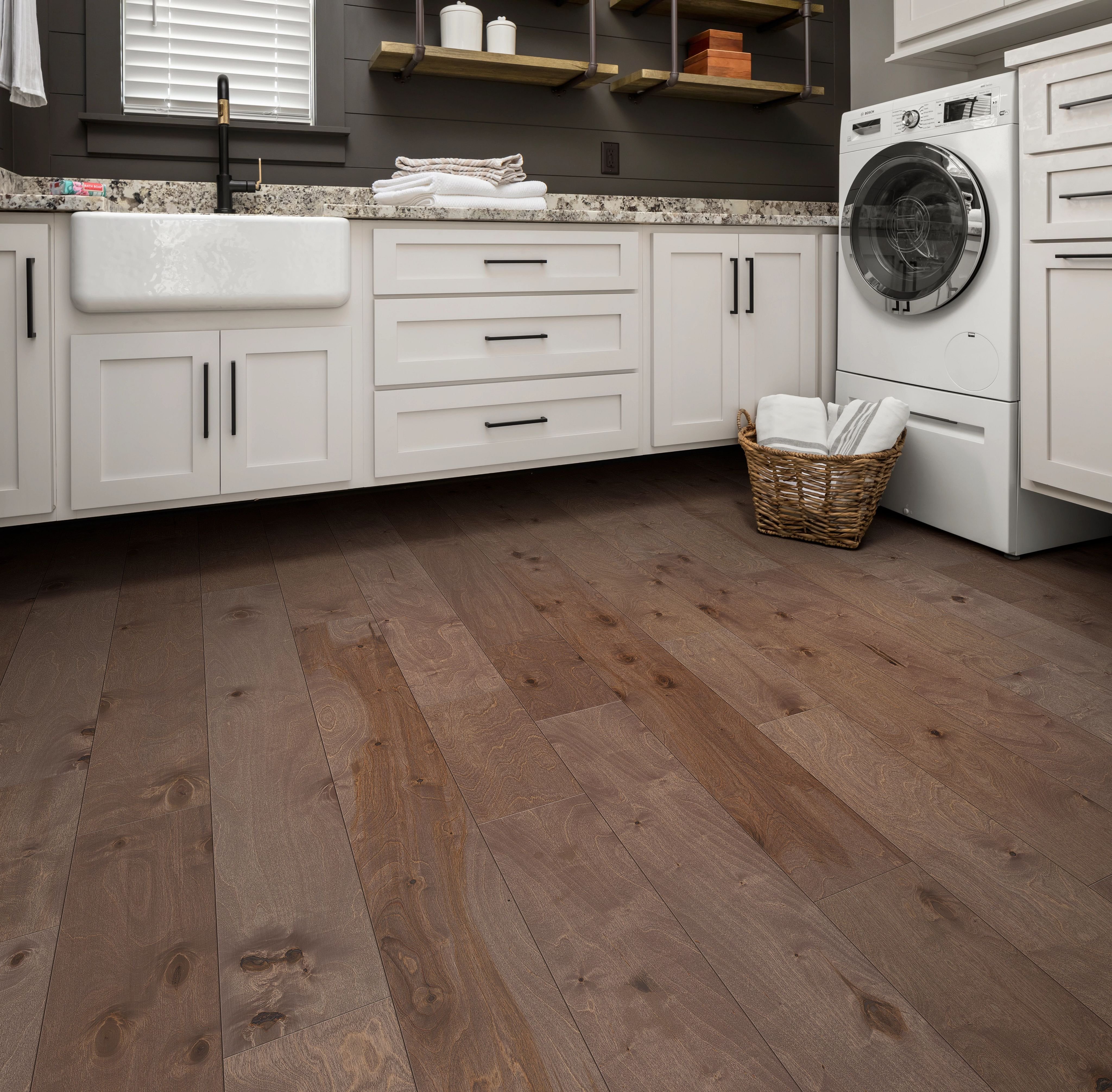 white bathroom cabinets and brown hardwood floor from Zinz Design and Selection Center Inc in Austintown, O
