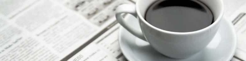 Coffee Cup On Newspaper in Austintown, OH